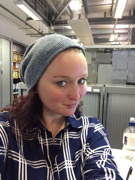 The photo is a self portrait of Sara. She is wearing a rather fetching hat.