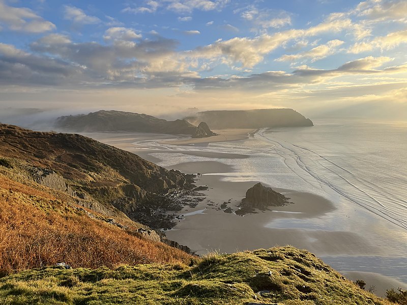 Sunrise over Three Cliffs Bay in Gower